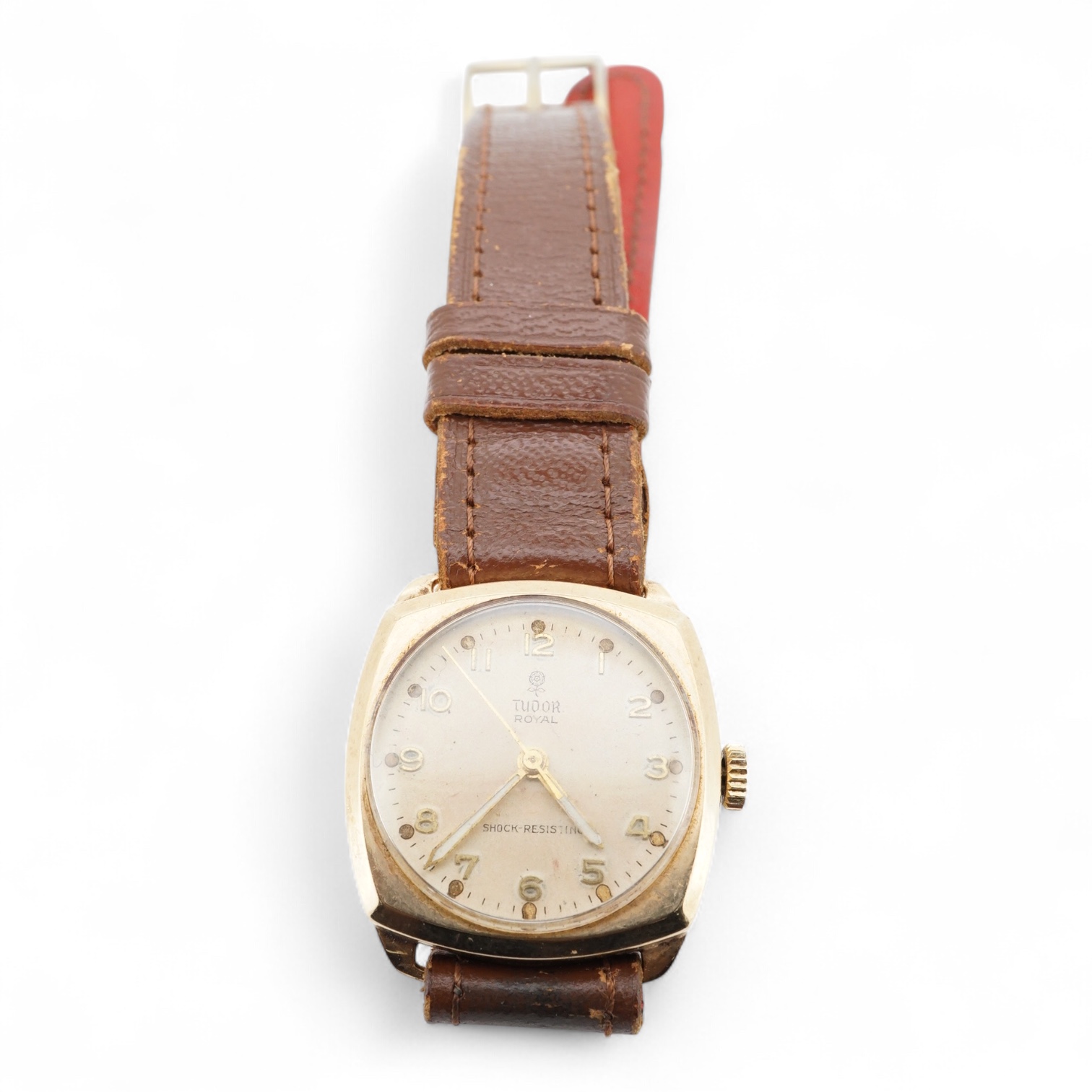 A 1950's 9ct gold Tudor Royal manual wind wrist watch, with Arabic dial, case diameter 27mm, with case back inscription, on a later associated strap.